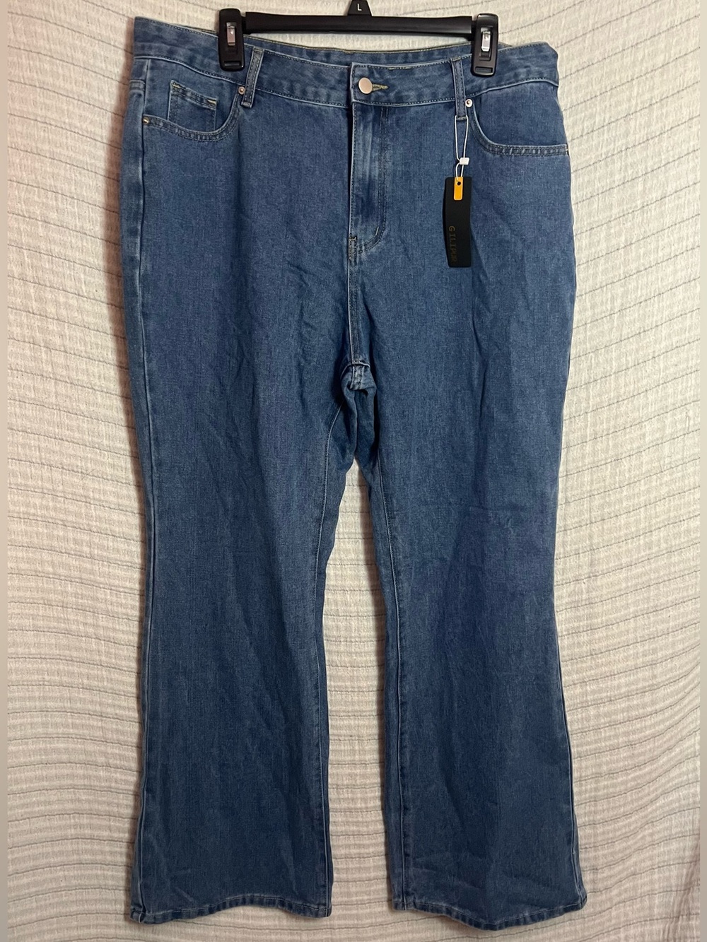 High-Rise Flare Leg Jeans in Medium Blue